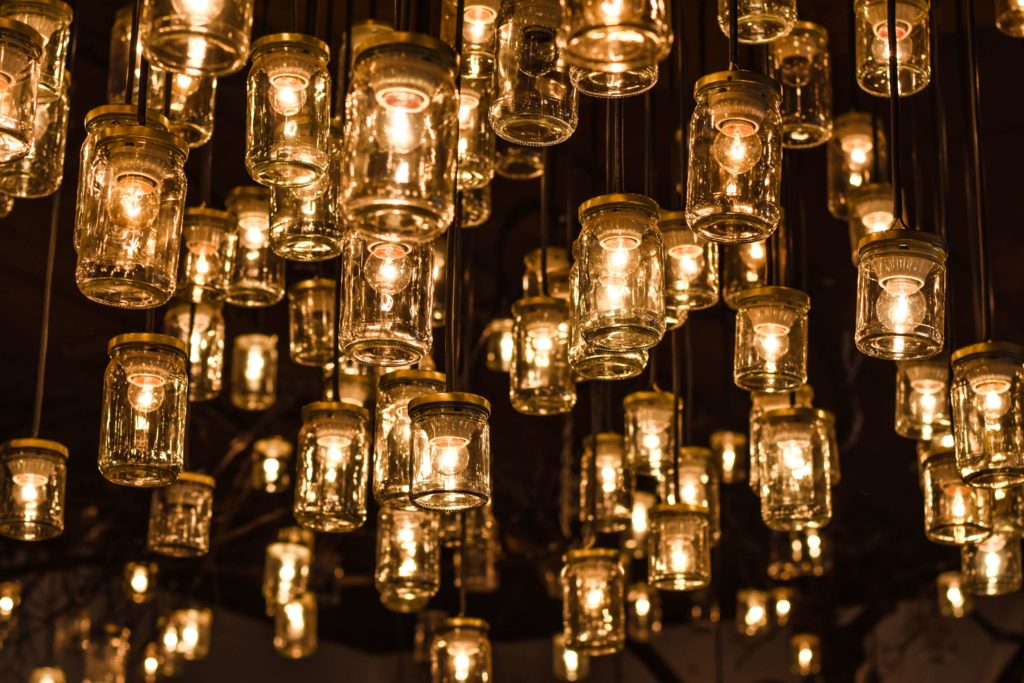 a-bunchb-of-pretty-lights-hanging-from-a-fixture